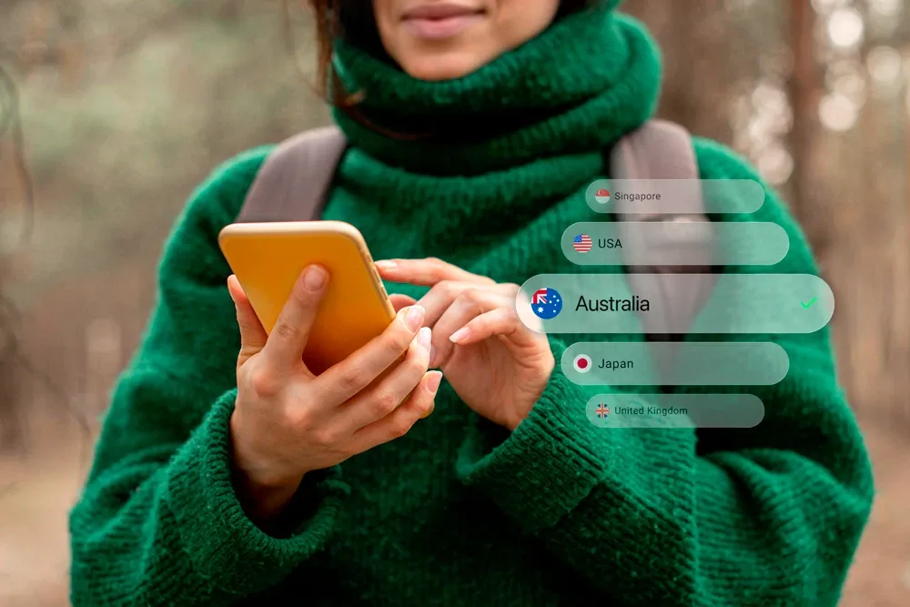woman selects a VPN server location from a list of available countries